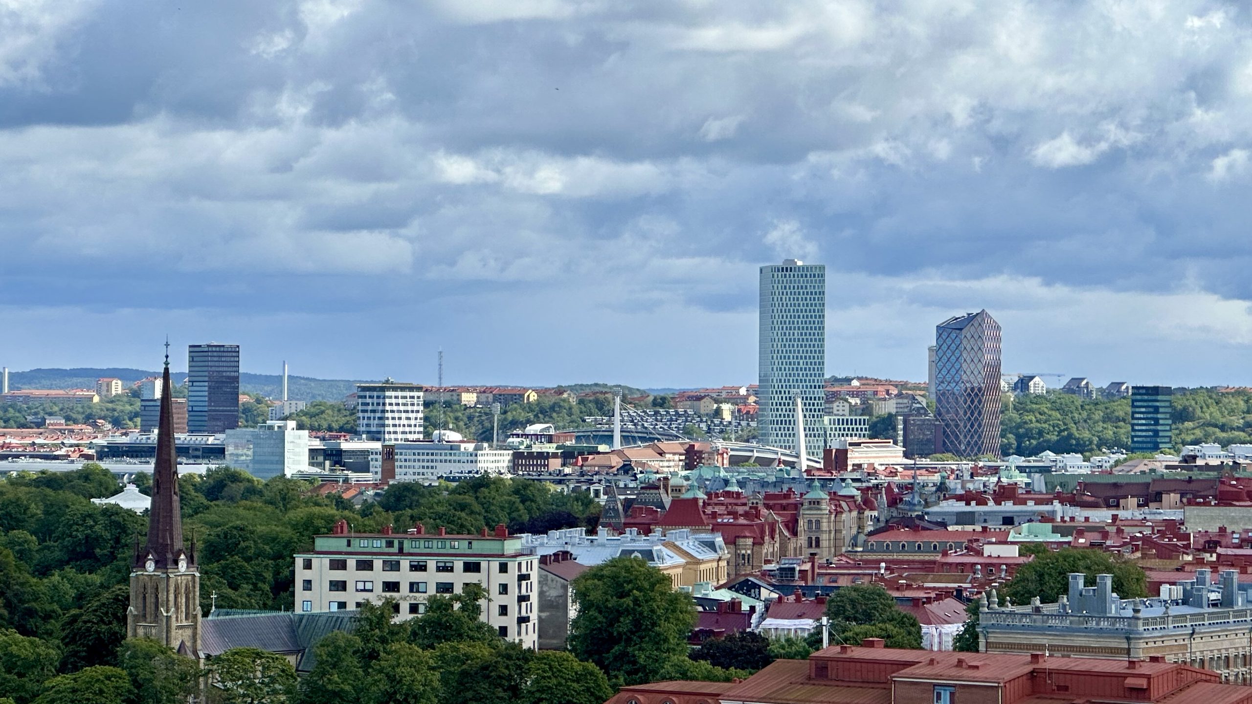 Panoramic view over Gothenburg from Skansen Kronan, with the city's spires, towers, parks and distant hills